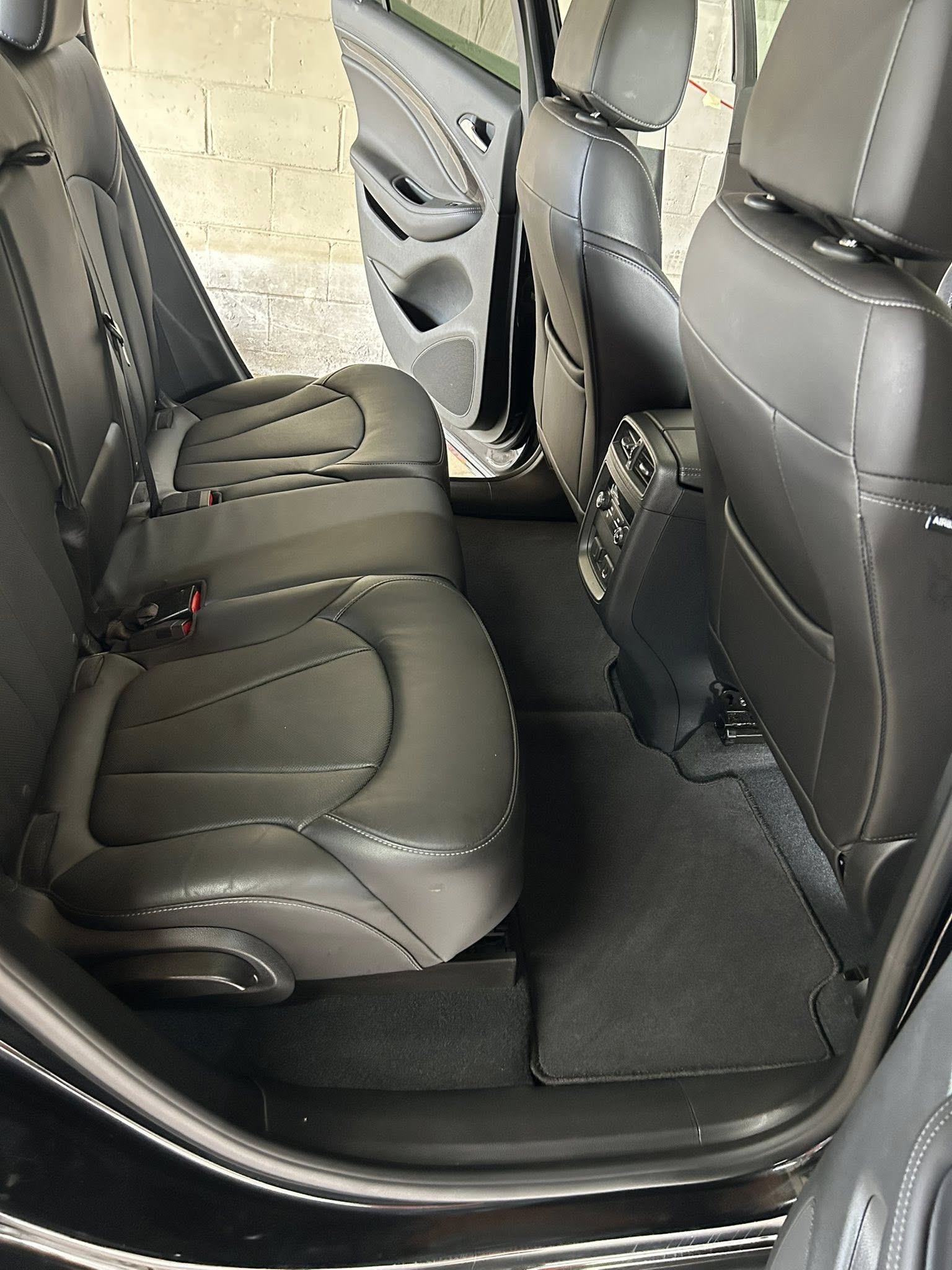 Clean black SUV interior rear seats
