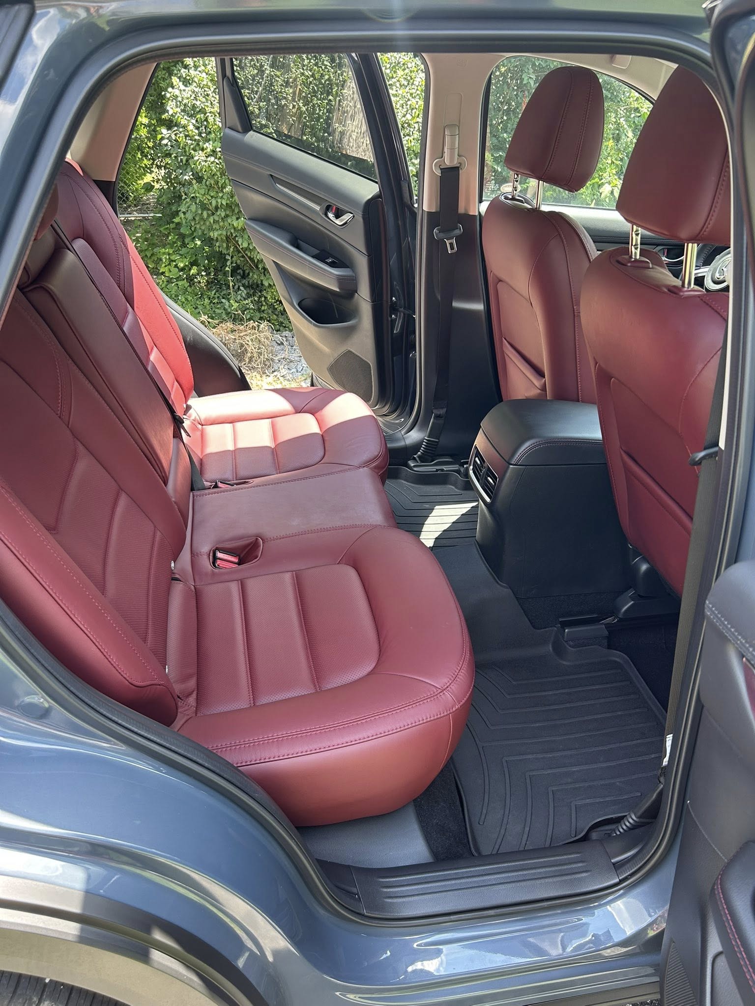 Clean car interior with red leather seats